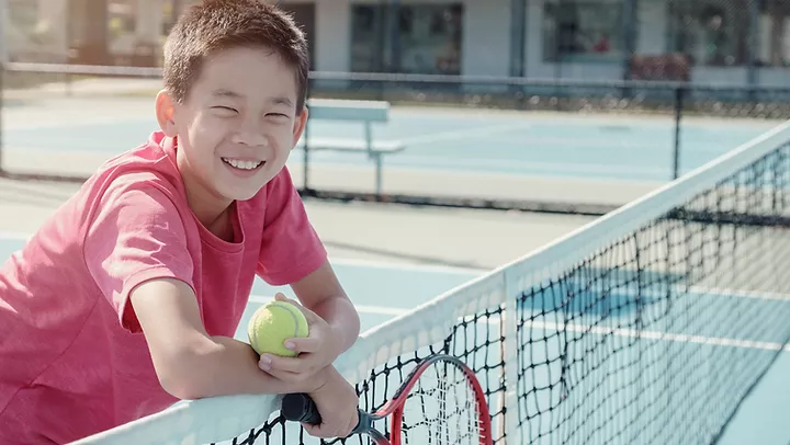 Boy-on-Tennis-Court